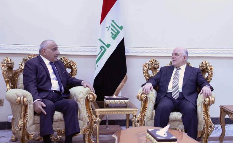 رئيس الوزراء العراقي حيدر العبادي يستقبل رئيس الوزراء المكلف عادل عبدالمهدي