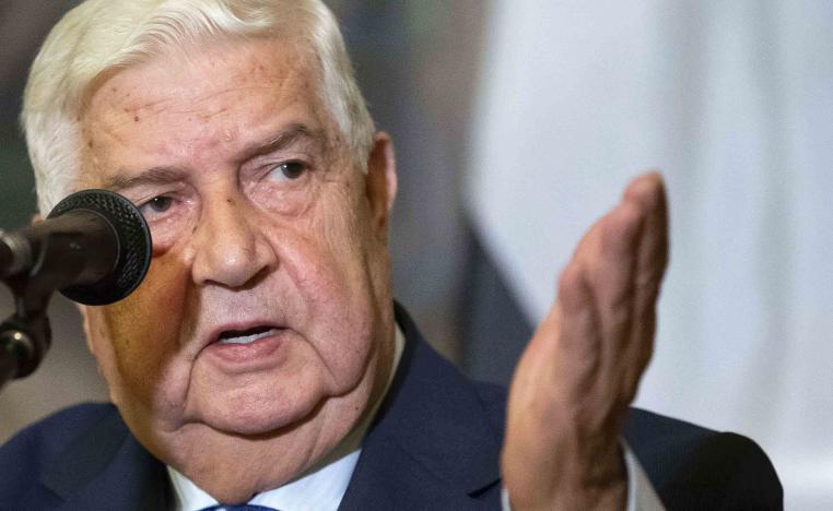 Syrian Foreign Minister Walid Muallem gestures as speaks to the media during the joint news conference with Russian Foreign Minister Sergey Lavrov, following their talks, in Moscow, Russia, Thursday, Aug. 30, 2018