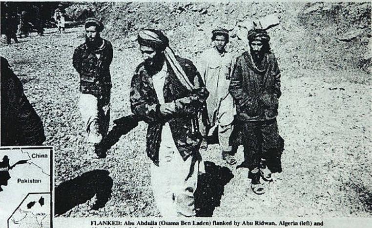 Enaam Arnaout, head of an Illinois Islamic charity, who was shown in the same Arab News report walking next to Bin Laden.