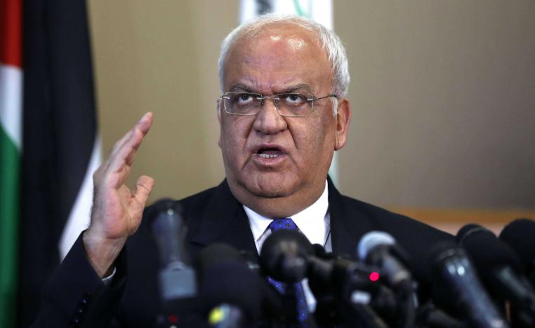 Palestine Liberation Organization's Secretary General Saeb Erekat speaks to journalists during a press conference in the West Bank