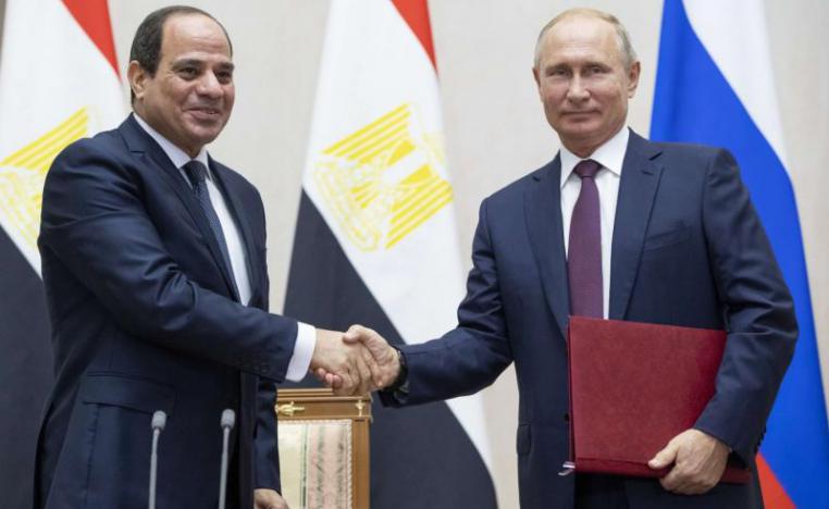 Russian President Vladimir Putin, right, and Egyptian President Abdel-Fattah el-Sisi shake hands after a signing ceremony following their talks in Sochi, Russia, Wednesday, October 17, 2018