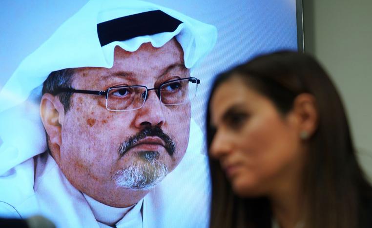 Sherine Tadros, head of New York (UN) Office of Amnesty International, speaks in front of a picture of Jamal Khashoggi during a news conference at the United Nations.