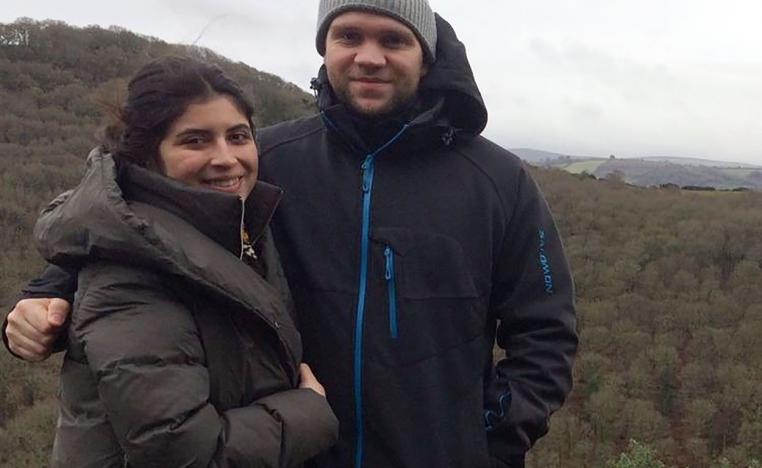 Photo released by the family of British student Matthew Hedges shows him (R) and his wife Daniela Tejada (L) posing in an undisclosed location.