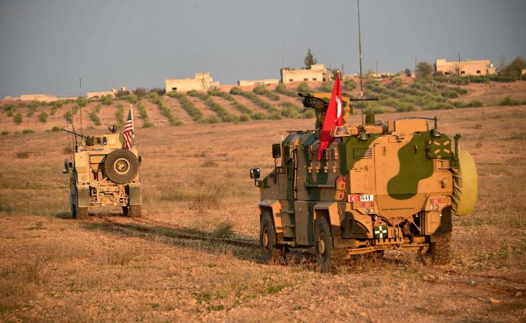 Turkish and U.S. troops are pictured during a joint patrol in Manbij area, northern Syria November 8, 2018.