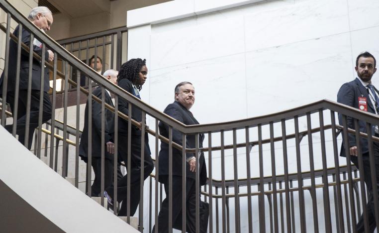 US Secretary of State Mike Pompeo walks to a briefing with members of the Senate to discuss developments in Saudi Arabia on Capitol Hill on November 28, 2018 in Washington, DC.