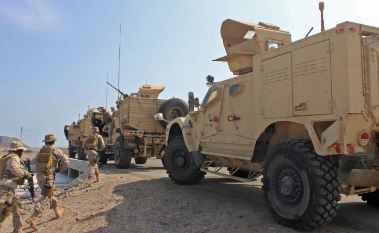Soldiers loyal to Saudi-led coalition forces are seen in the southern Yemeni port of Aden.