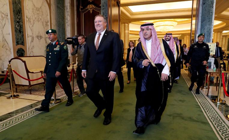 U.S. Secretary of State Mike Pompeo walks with Saudi Foreign Minister Adel al-Jubeir in Riyadh, Saudi Arabia, October 16, 2018.