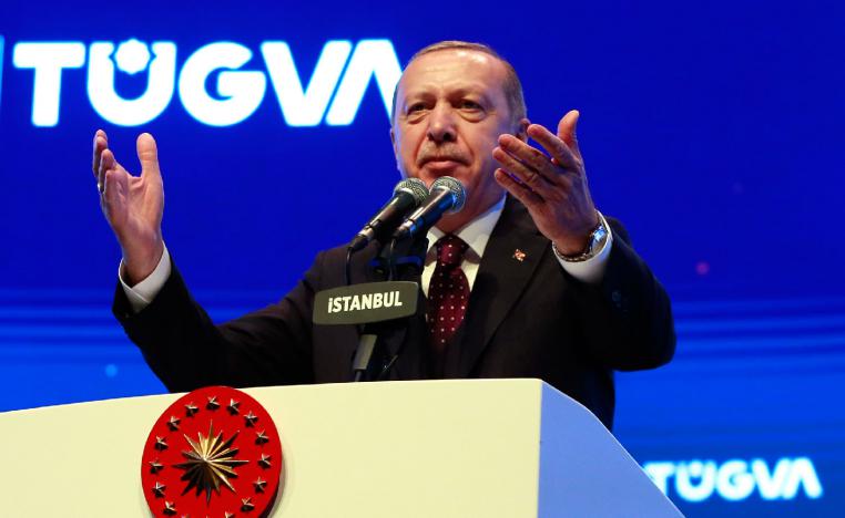 Turkey's President Recep Tayyip Erdogan addresses a meeting of a youth organisation founded by his elder son Bilal Erdogan and his friends, in Istanbul Saturday, Dec. 22, 2018. 