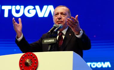 Turkey's President Recep Tayyip Erdogan addresses a meeting of a youth organisation founded by his elder son Bilal Erdogan and his friends, in Istanbul Saturday, Dec. 22, 2018. 