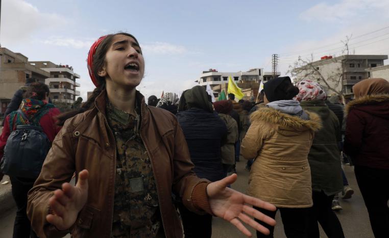 Syrian Kurds take part in a demonstration in the northeastern Syrian Kurdish-majority city of Qamishli on December 28, 2018, against threats from Turkey to carry out a fresh offensive following the US decision to withdraw their troops.