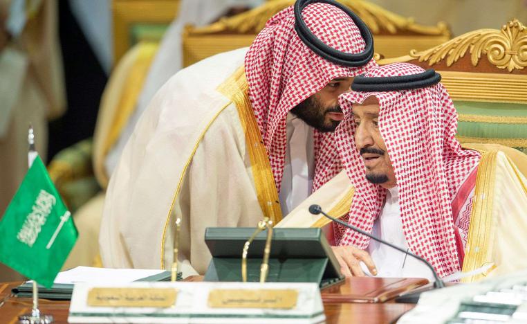 Saudi Arabia's Crown Prince Mohammed bin Salman talks with Saudi Arabia's King Salman bin Abdulaziz Al Saud during the Gulf Cooperation Council's (GCC) Summit in Riyadh, Saudi Arabia December 9, 2018. 