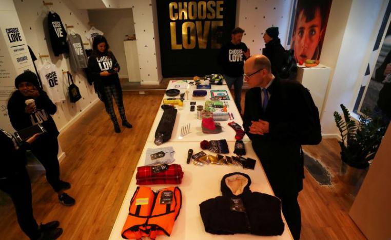 Customers looks at items for sale at the pop-up shop in London