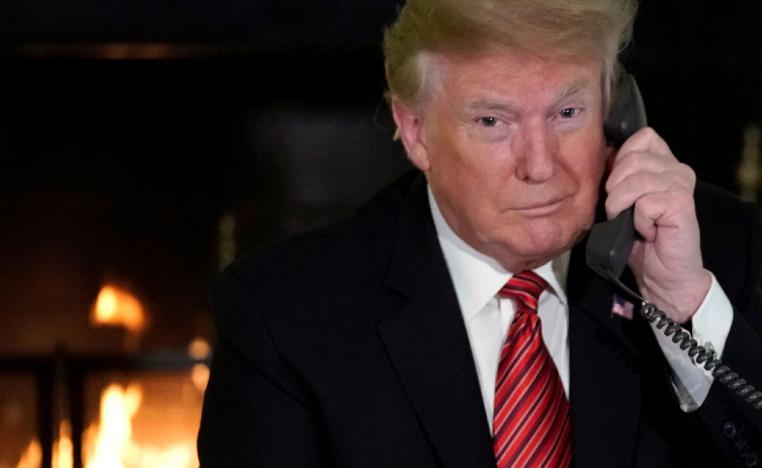 US President Donald Trump participates in NORAD Santa tracker phone calls from the White House in Washington, US December 24, 2018.