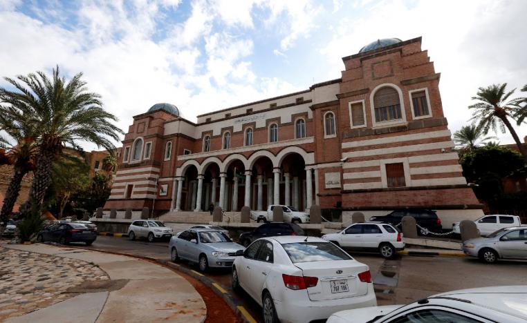 Cars are parked outside the Central Bank of Libya in Tripoli, Libya November 14, 2017.