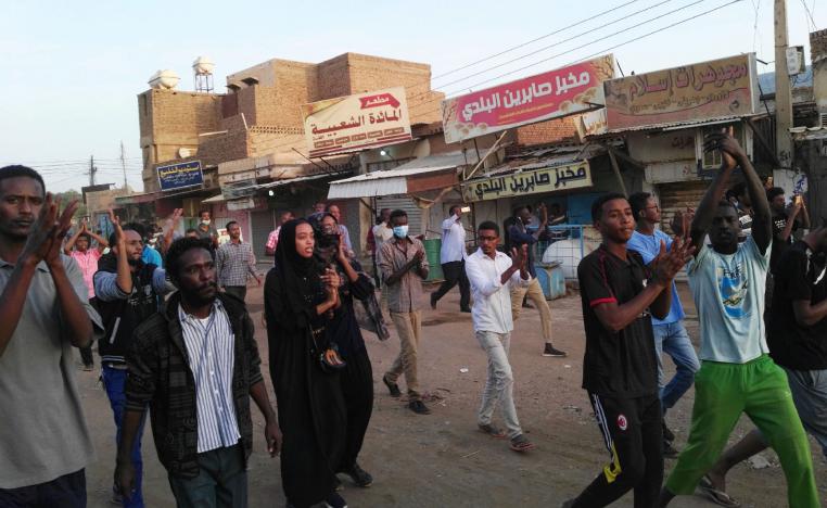 A picture taken on January 15, 2019 shows anti-government demonstrators in the Sudanese capital Khartoum's southern business district of El-Kalakla.