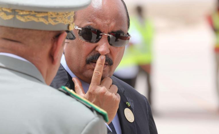 Mauritanian President Mohamed Ould Abdel Aziz waits for the arrival of the French President at Nouakchott airport on July 2, 2018.