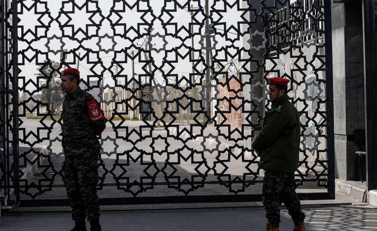 Palestinian security forces loyal to Hamas stand at the Rafah crossing point between Egypt and the southern Gaza Strip