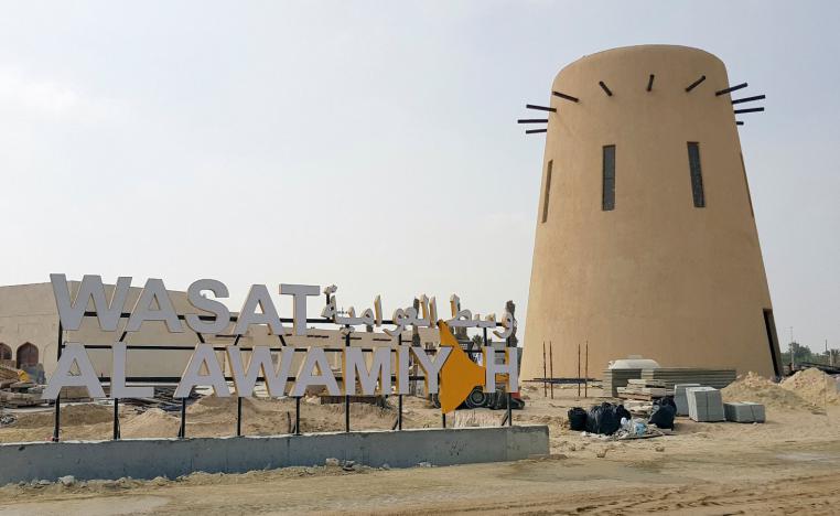 A sign is seen at a new Saudi state-run development project in the old quarter of Shi'ite town Awamiya, Saudi Arabia on January 8, 2019.