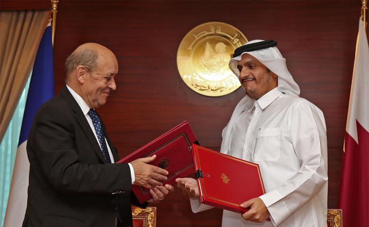 Qatari FM exchanges signed agreements with his French counterpart 