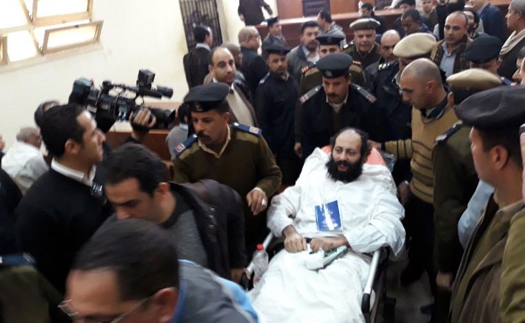 Ramon Rasmi Mansour, known as Faltaous al-Makari, lies on a stretcher after his and monk Isaiah's (not seen) trial session, at the courthouse in a courtroom where he was convicted along with Wael Saad, known as Isaiah al-Makari, of murdering Bishop Epiphanius, the abbot of Saint Macarius Monastery northwest of Cairo, in Damanhour, Egypt February 23, 2019.