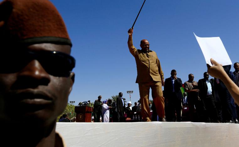 Sudan's President Omar al-Bashir waves to his supporters during a rally at the Green Square in Khartoum, Sudan January 9, 2019. 
