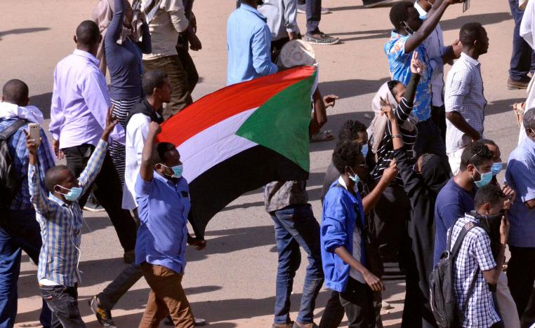 Sudanese demonstrators chant slogans as they march along the street during anti-government protests in Khartoum, Sudan December 25, 2018.