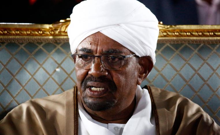 Sudanese President Omar al-Bashir sits before delivering a speech to the nation on February 22, 2019, at the presidential palace in the capital Khartoum.