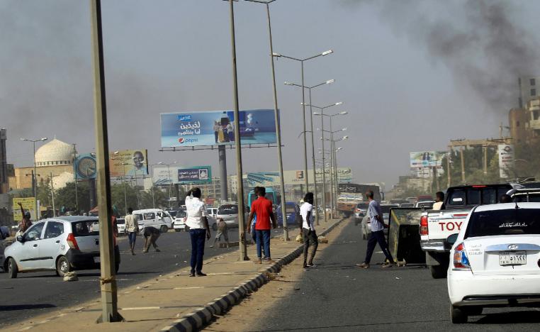 Cars block a road as Sudanese demonstrators stage anti-government protests in Khartoum, Sudan January 25, 2019. 