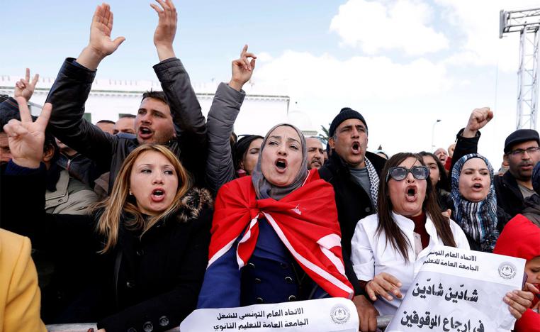 The protesters called on Education Minister Hatem Ben Salem to step down