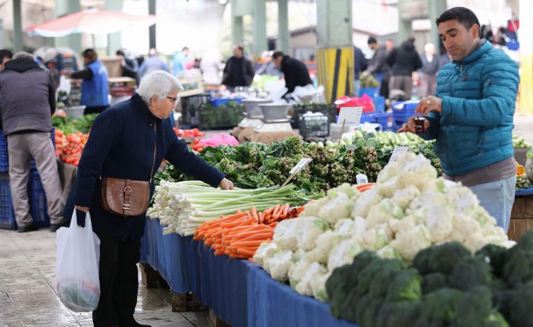 A woman shops for vegetables at a market in the Turkish capital Ankara, on February 13, 2019.