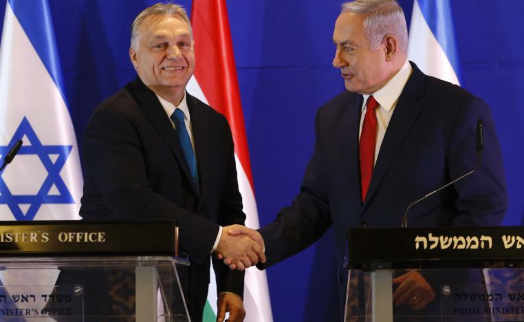 Hungarian Prime Minister Viktor Orban (L) and Israeli Prime Minister Benjamin Netanyahu shake hands during a press conference after their meeting in Jerusalem on February 19, 2019.