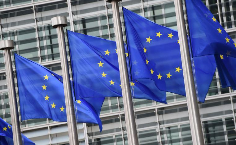 European flags flutter in front of the European Commission building in Brussels, on September 10, 2014.