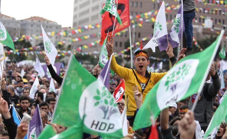 People wave pro-Kurdish Peoples' Democratic Party (HDP) flags during a gathering to celebrate Nowruz, which marks the arrival of spring and the new year, in Istanbul, Turkey March 24, 2019.