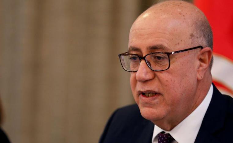 Governor of the Central Bank of Tunisia Marouane El Abassi attends a news conference in Tunis, February 20.