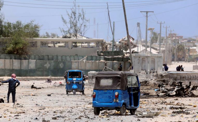 Rickshaws are seen near the scene of a suicide explosion after al-Shabaab militia stormed a government building in Mogadishu, Somalia March 23, 2019. 
