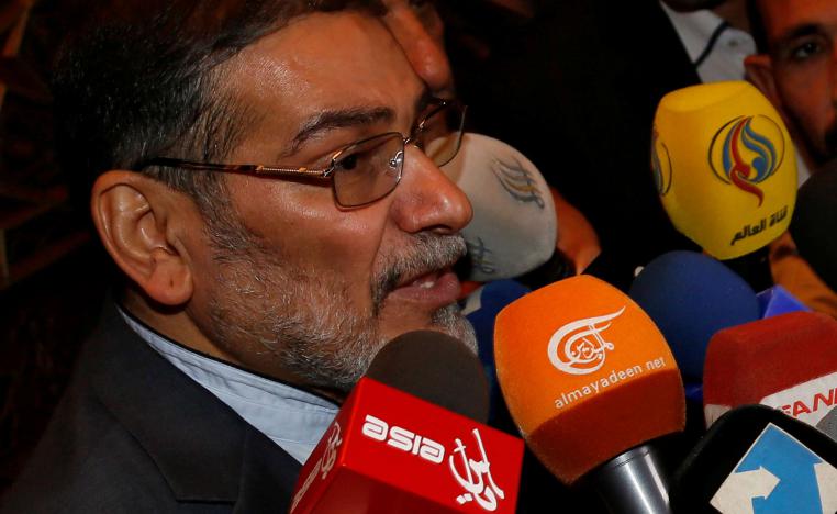 Admiral Ali Shamkhani, Iran's Supreme National Security Council Director, speaks to the media after his arrival at Damascus airport, September 30, 2014.