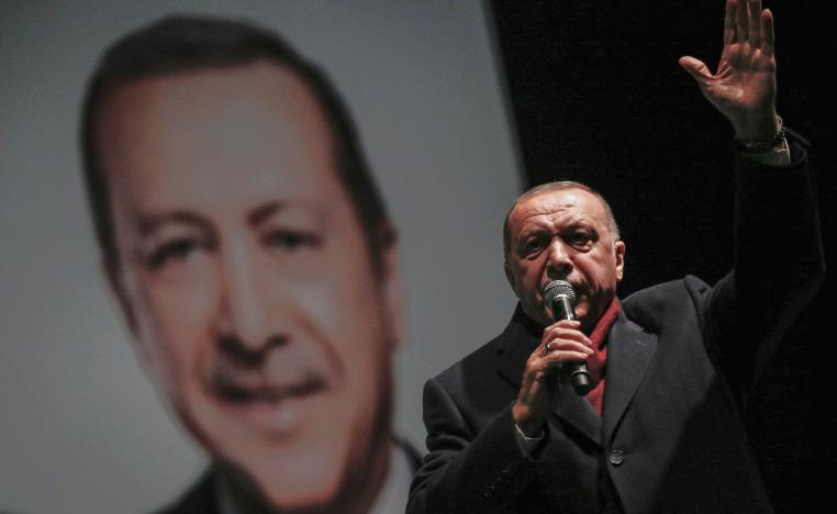 Turkey's President Recep Tayyip Erdogan addresses the supporters of his ruling Justice and Development Party, AKP, at a rally in Istanbul, late Tuesday, March 19, 2019, ahead of local elections scheduled for March 31, 2019.