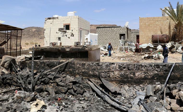The scene of an air strike that hit a gas station near a hospital in Kutaf district of Saada province