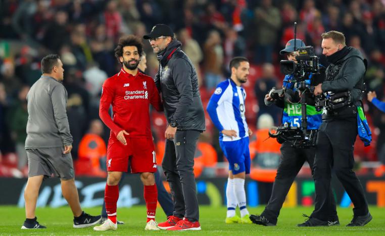 المدرب يورغن كلوب رفقة نجمه صلاح