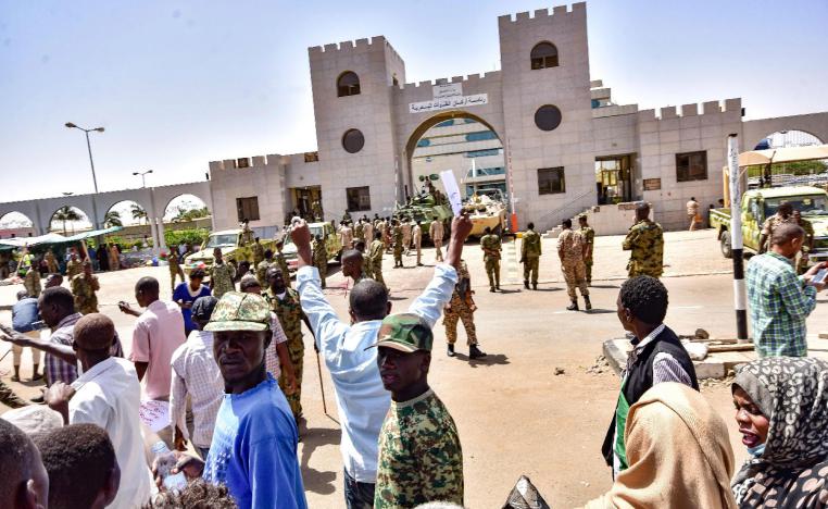 Sudanese demonstrators gather during a rally demanding civilian rule outside army headquarters in Khartoum.