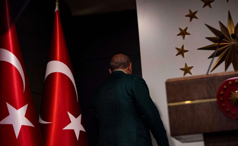 Erdogan leaves stage after giving a statement following the local elections in Istanbul