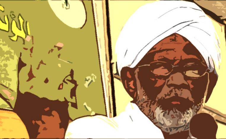 عصاه الخيزرانية المتشبهة بعصا المارشالية والمتكيفة لظهور السودانيين الملتمعة تحت الشمس