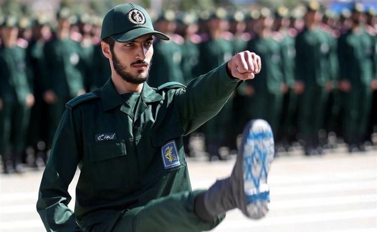 An Iranian Officer of Revolutionary Guards, with Israel flag drawn on his boots, is seen during graduation ceremony, held for the military cadets in a military academy, in Tehran, Iran June 30, 2018.