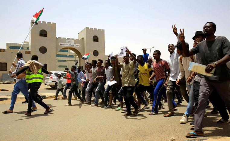 Protesters chant slogans outside Defence Ministry in Khartoum
