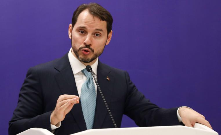 Turkey's minister of Treasury and Finance Berat Albayrak gestures as he speaks during a joint press conference with Turkey's Foreign Minister, Justice Minister and Interior Minister after attending the meeting of 5th Reform Action Group in Ankara, on December 11, 2018.