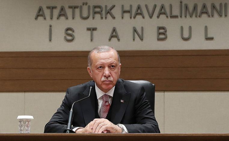 Turkey's President Recep Tayyip Erdogan talks to members of the media regarding the local elections, in Istanbul, Monday, April 8, 2019, prior to his departure for Russia.
