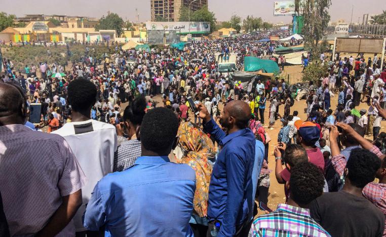 Protesters rally at a demonstration near the military headquarters, Tuesday, April 9, 2019, in the capital Khartoum, Sudan.