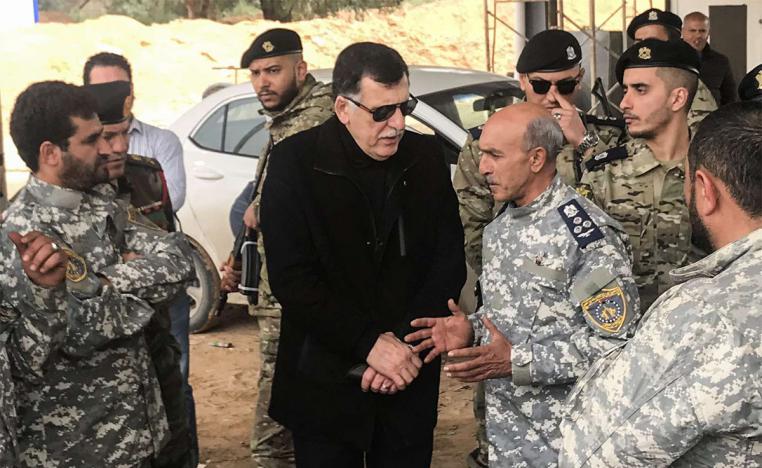 Sarraj visits military and security commanders of the government forces who supervised recapture of the checkpoint 27 in Janzour