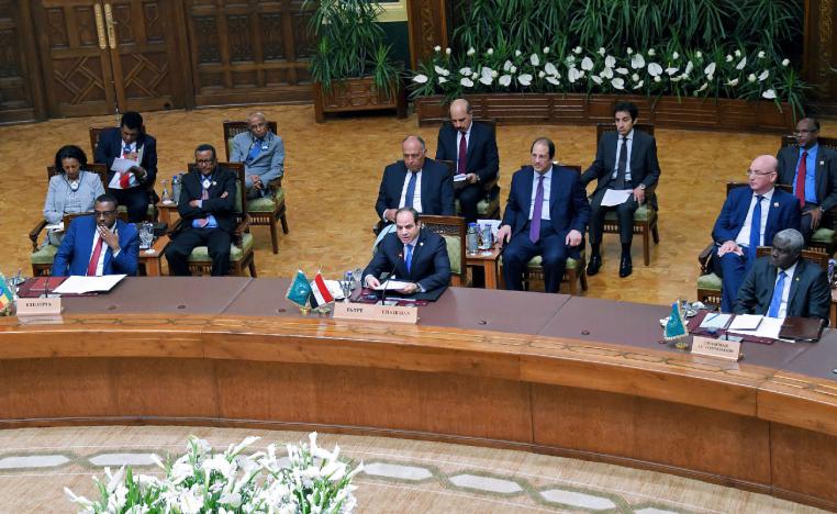 Egyptian President Abdel Fattah al-Sisi (C) speaking during a summit with African leaders in the capital Cairo