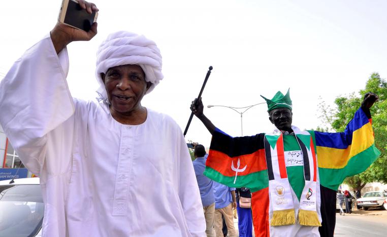 Demonstrators chant slogans along the streets after Sudan's Defense Minister Awad Mohamed Ahmed Ibn Auf said that President Omar al-Bashir had been detained "in a safe place" and that a military council would run the country for a two-year transitional period in Khartoum, Sudan April 11, 2019.